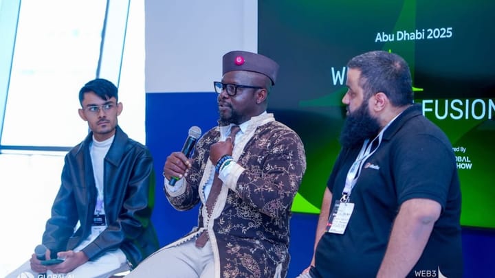 Mamadou Kwidjim Toure, CEO of Ubuntu Tribe, speaking onstage with other panelists at Abu Dhabi Finance Week.